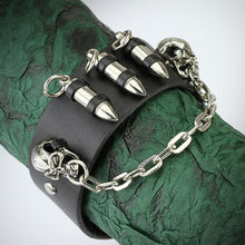 Load image into Gallery viewer, Black Leather Bracelet with Chained Skulls and Three Bullets with Adjustable Snap Button Closure
